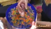 Video porn Young girl makes soft hanjob with lots of oil and water balls of free